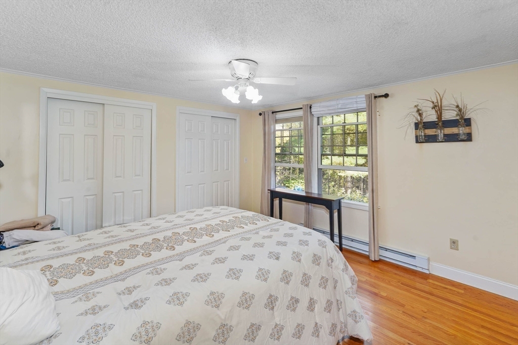 40 Breakneck Road Sturbridge, MA 01566 - Photo 20 of 39 a bedroom with a bed and a window