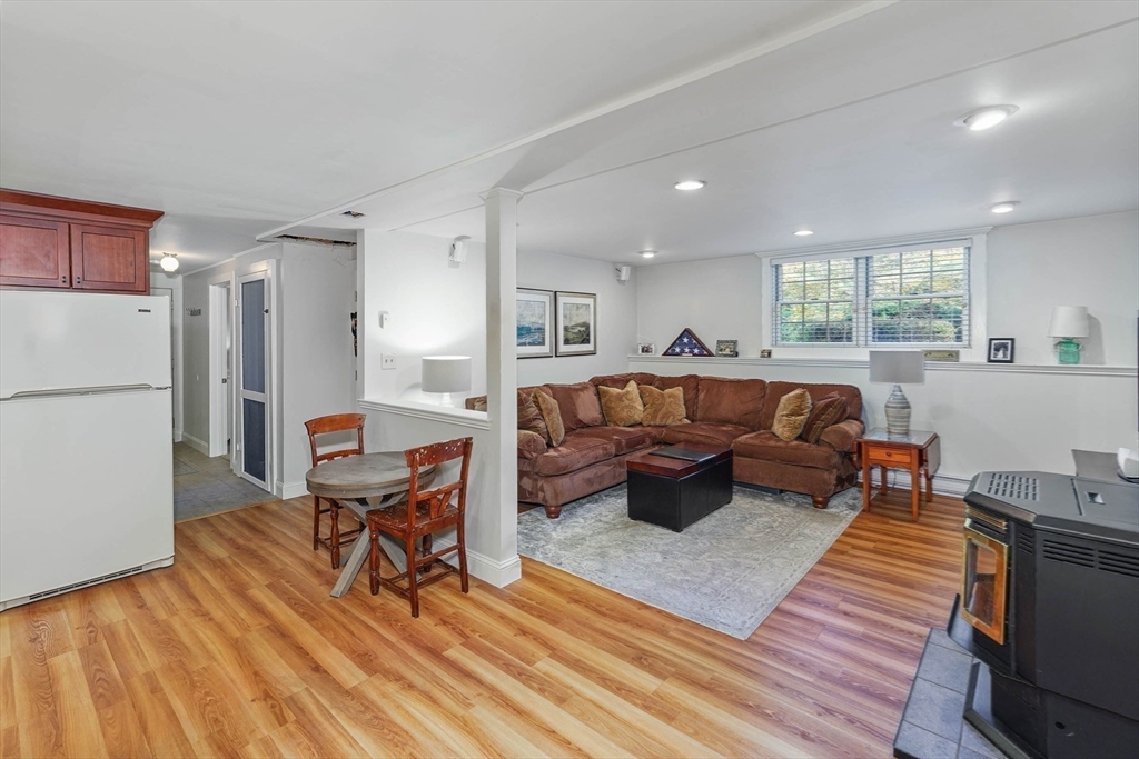 40 Breakneck Road Sturbridge, MA 01566 - Photo 22 of 39 a living room with furniture and a table
