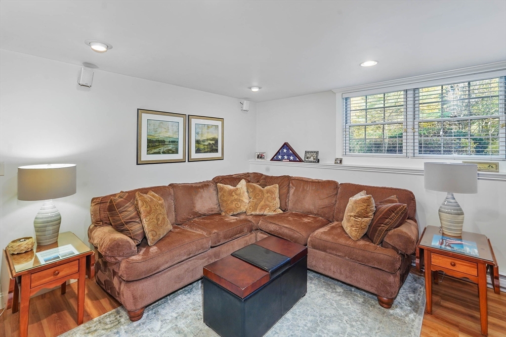 40 Breakneck Road Sturbridge, MA 01566 - Photo 23 of 39 a living room with furniture and a large window