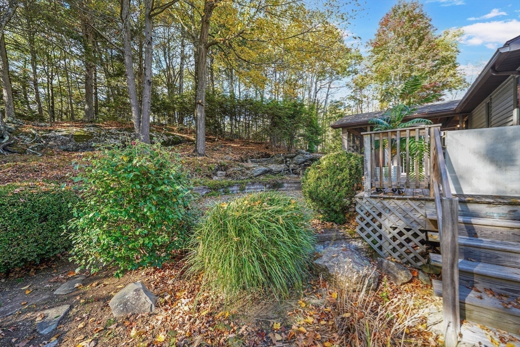 40 Breakneck Road Sturbridge, MA 01566 - Photo 34 of 39 a backyard of a house with lots of green space