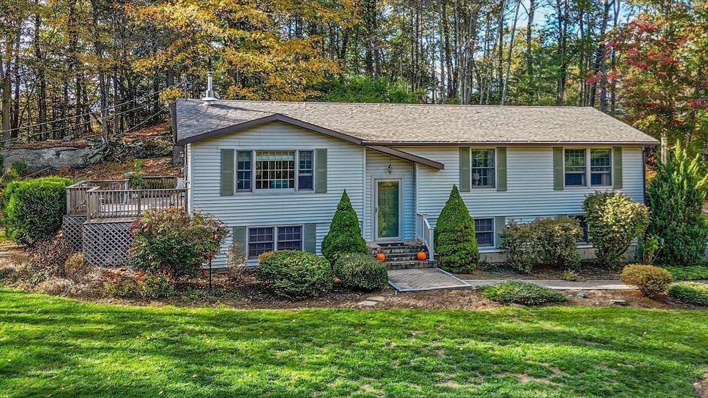40 Breakneck Road Sturbridge, MA 01566 - Photo 39 of 39 a front view of a house with a yard and porch