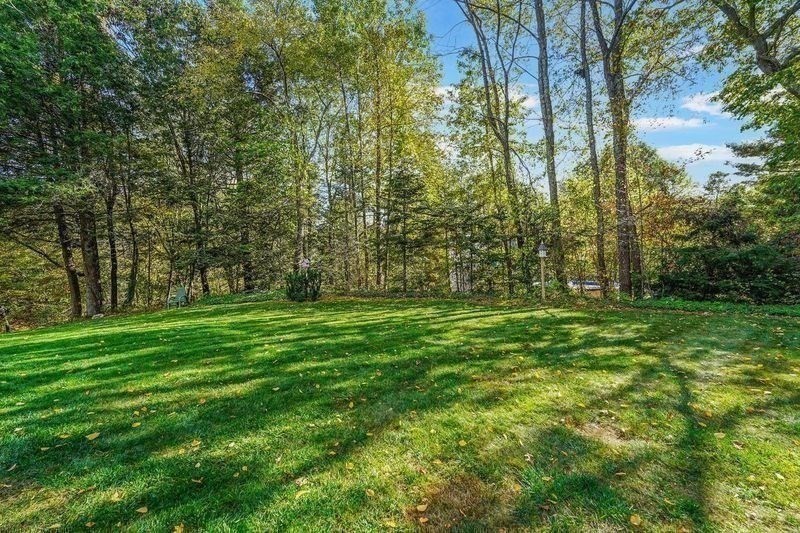 40 Breakneck Road Sturbridge, MA 01566 - Photo 5 of 39 a view of outdoor space with trees all around