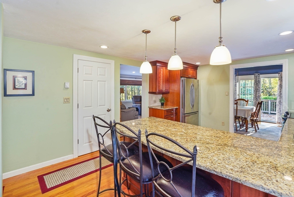 40 Breakneck Road Sturbridge, MA 01566 - Photo 10 of 39 a view of a dining room with furniture window and wooden floor