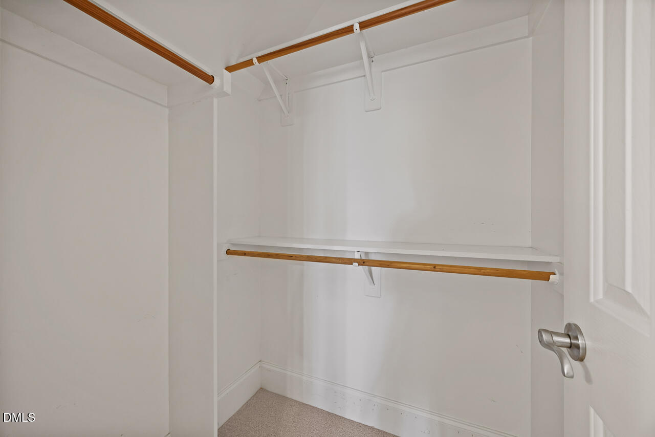 4004 Frontenac Court Apex, NC 27539 - Photo 46 of 61 a view of a room with racks on the wall