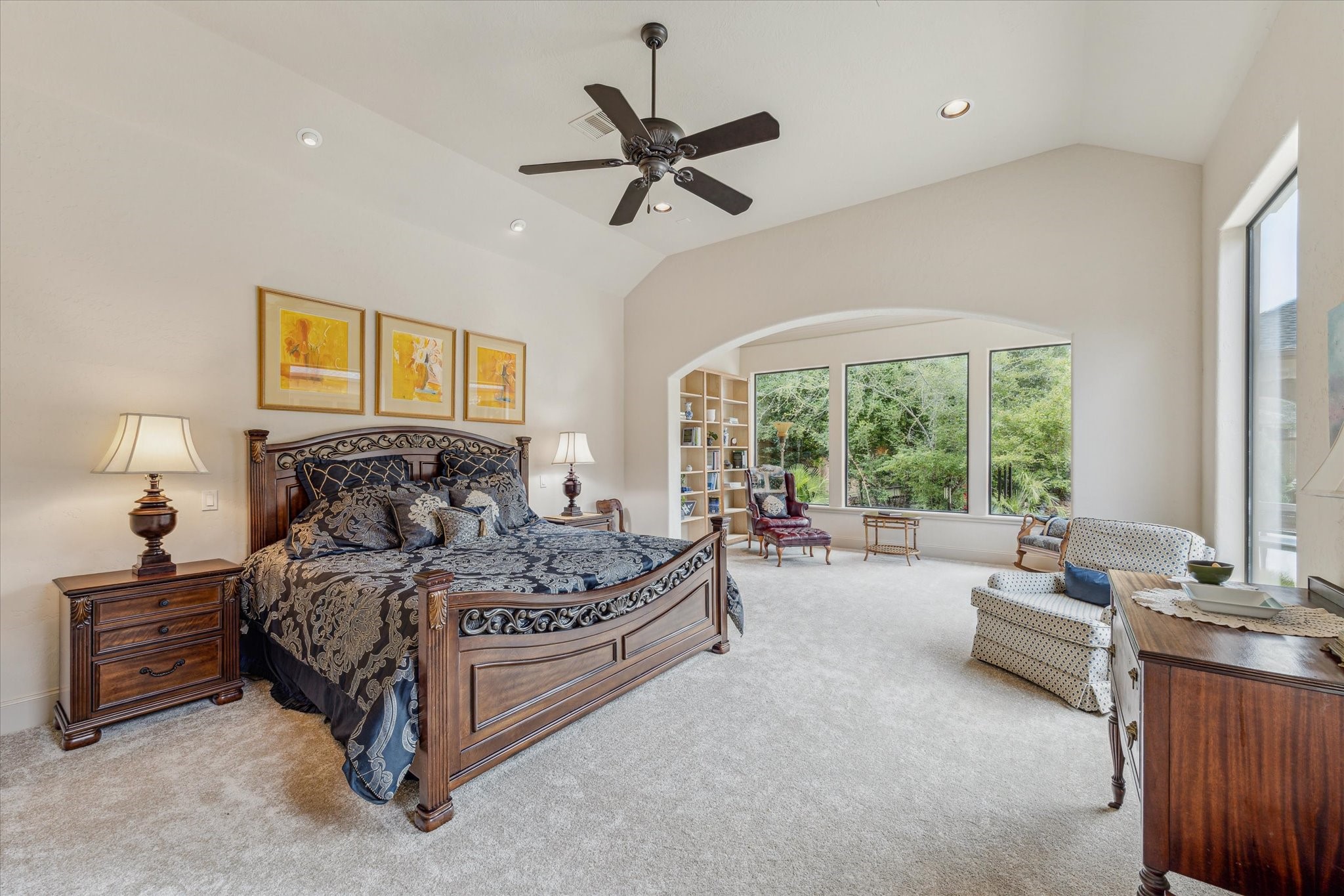 7611 Morgans Pond Court Spring, TX 77389 - Photo 14 of 50 a spacious bedroom with a bed and a couch