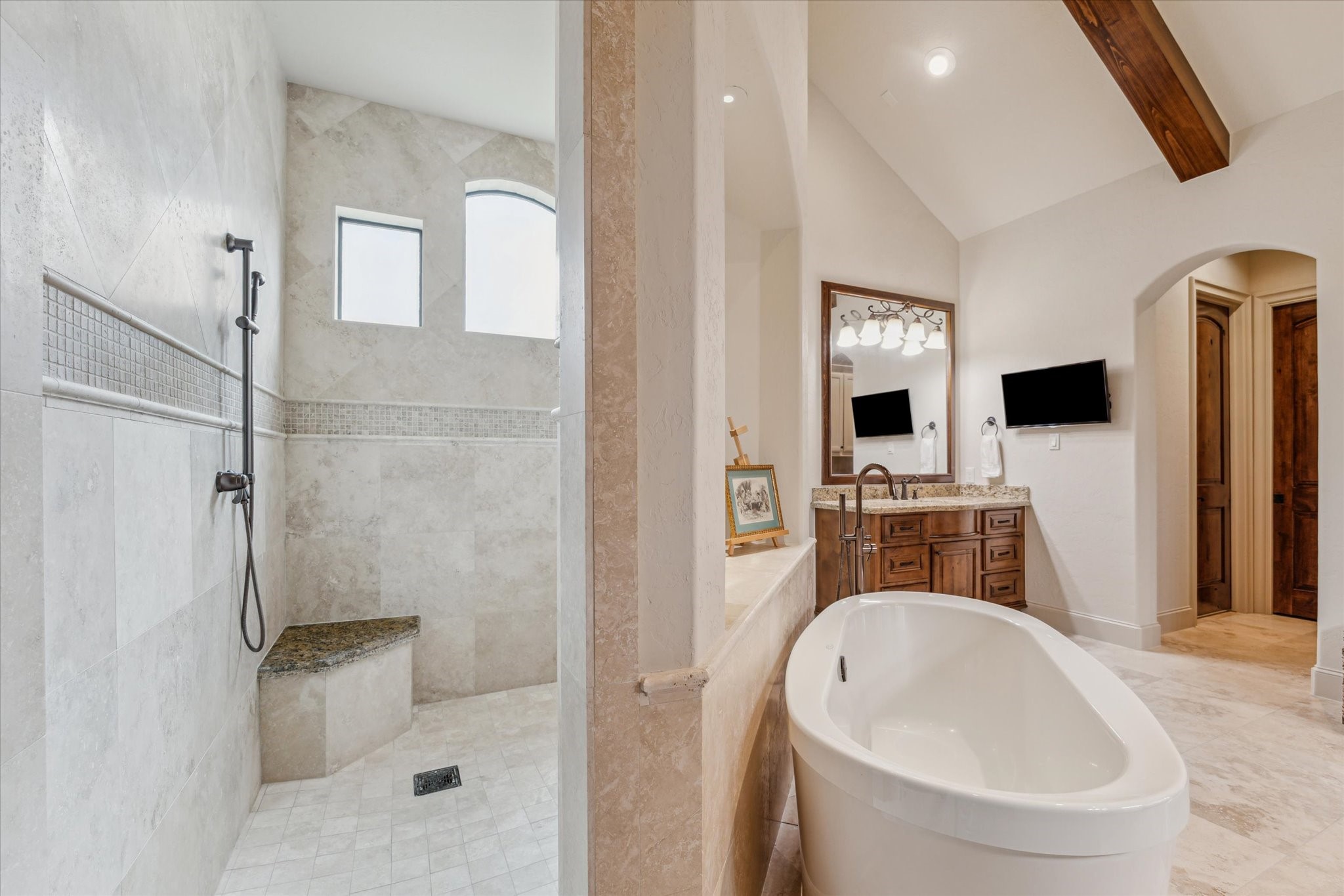 7611 Morgans Pond Court Spring, TX 77389 - Photo 18 of 50 a bathroom with a tub sink and mirror