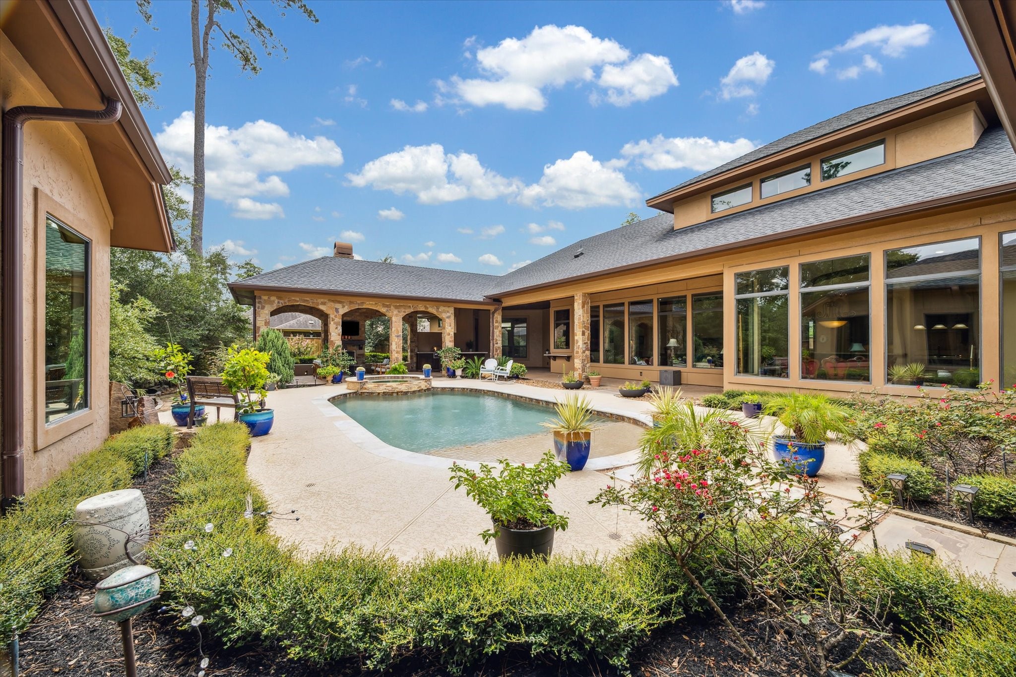 7611 Morgans Pond Court Spring, TX 77389 - Photo 29 of 50 a view of a house with swimming pool and sitting area