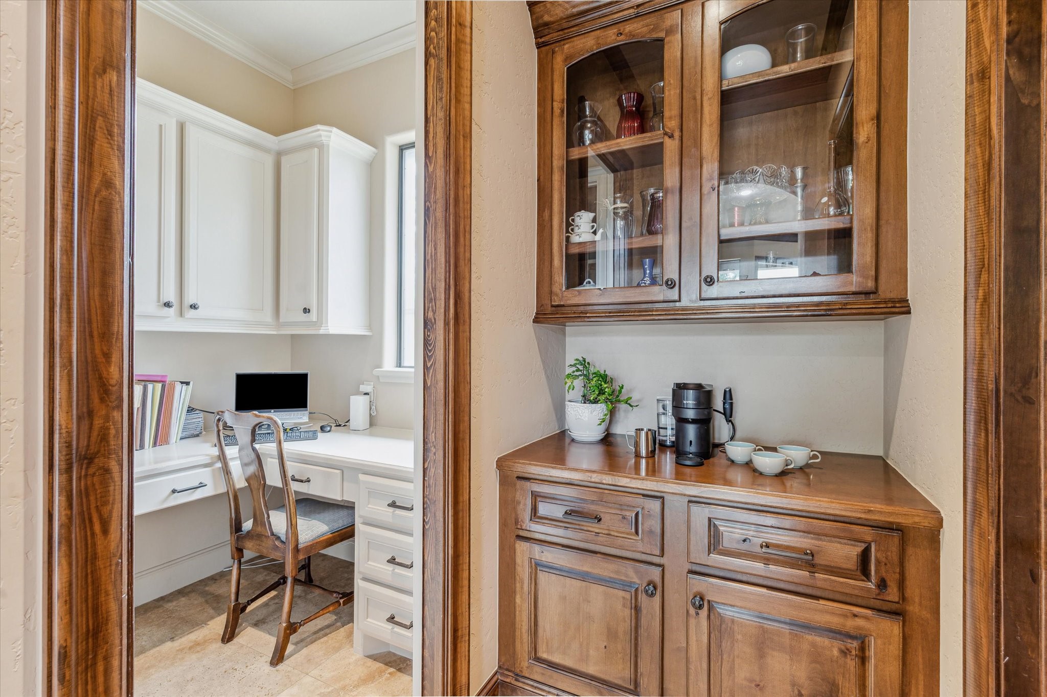 7611 Morgans Pond Court Spring, TX 77389 - Photo 49 of 50 a kitchen with white cabinets and chair