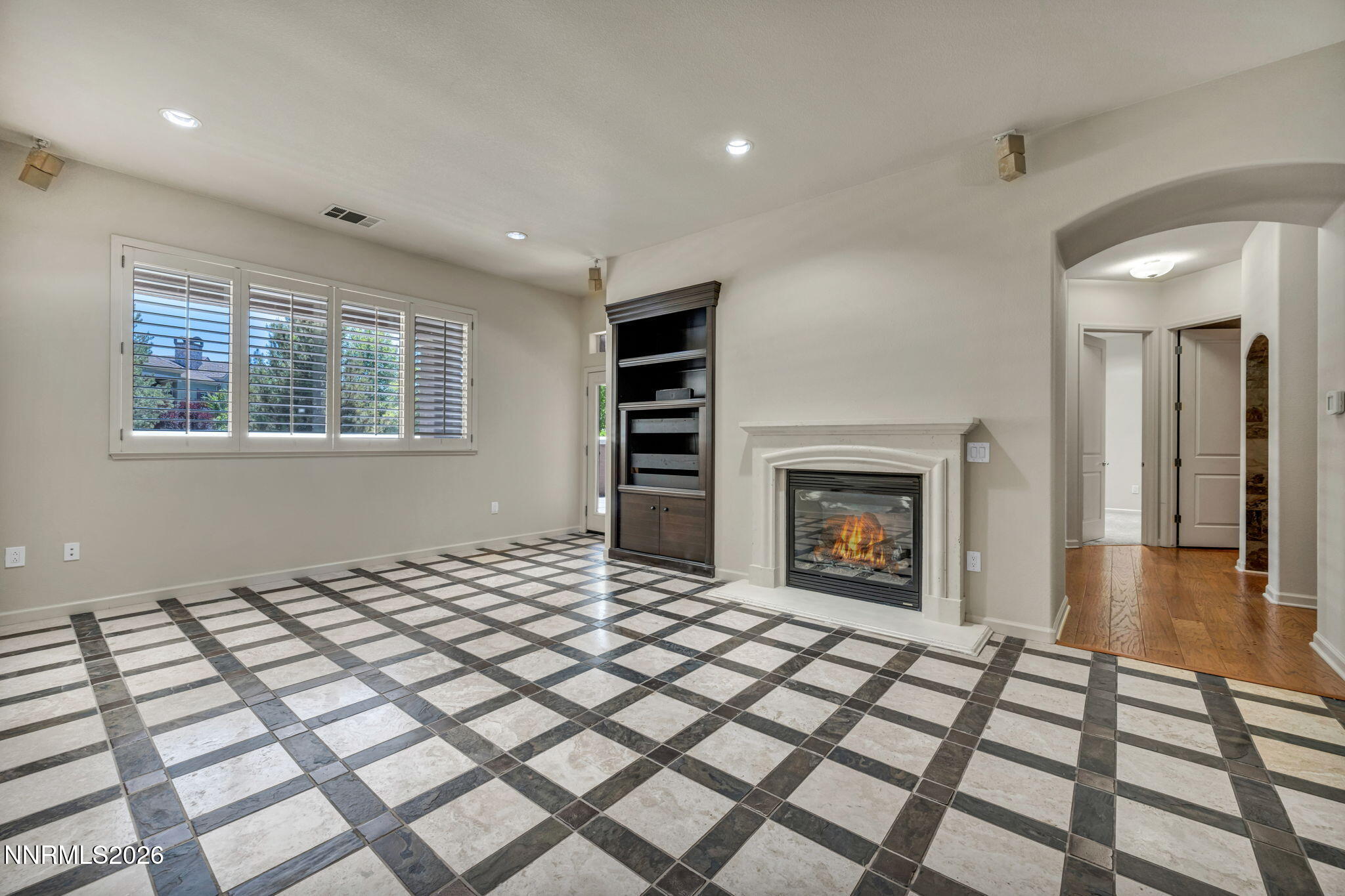 9900 Wilbur May Parkway, Unit 2801 Reno, NV 89521 - Photo 11 of 70 a view of a livingroom with a fireplace and window