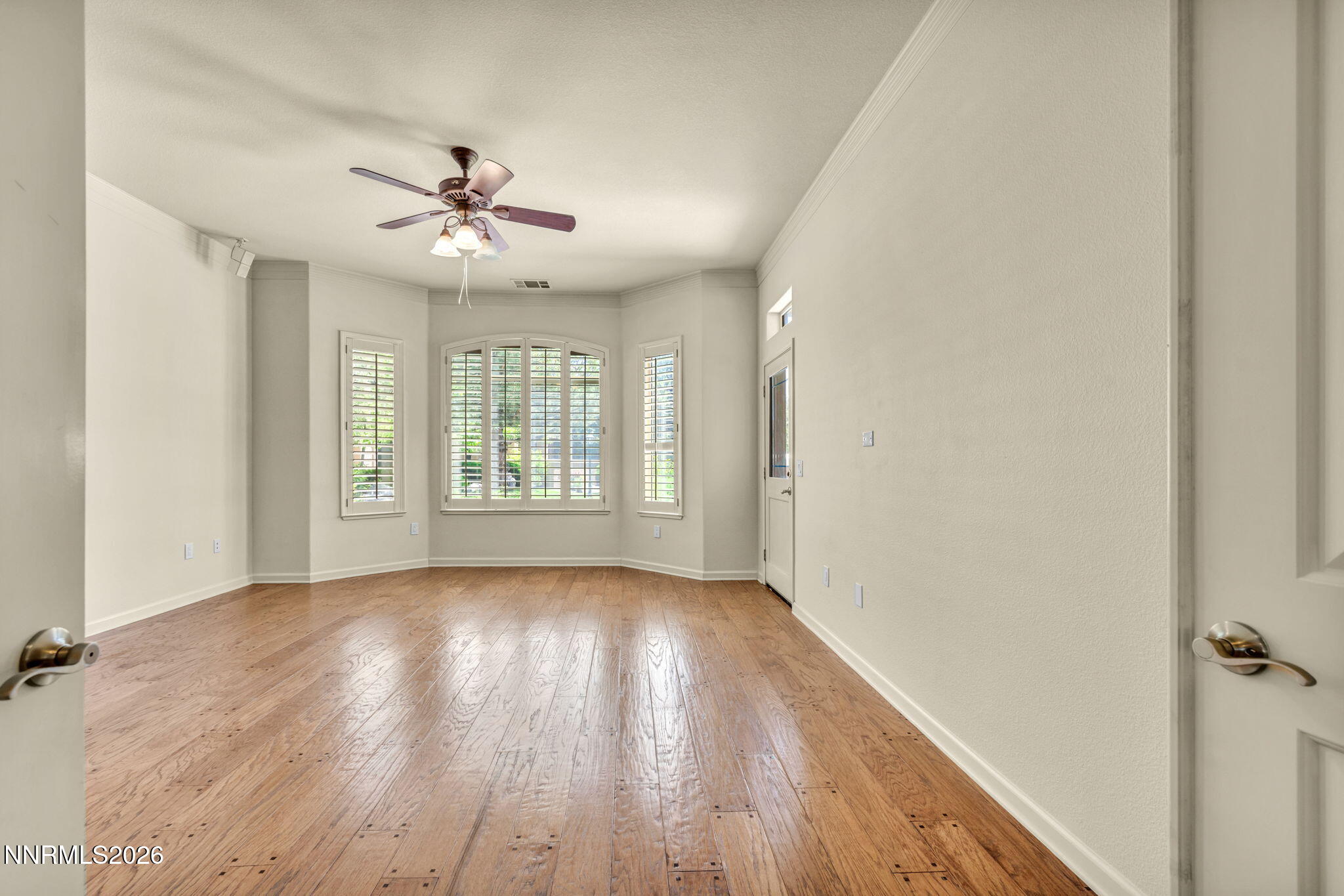 9900 Wilbur May Parkway, Unit 2801 Reno, NV 89521 - Photo 30 of 70 wooden floor in an empty room with a window