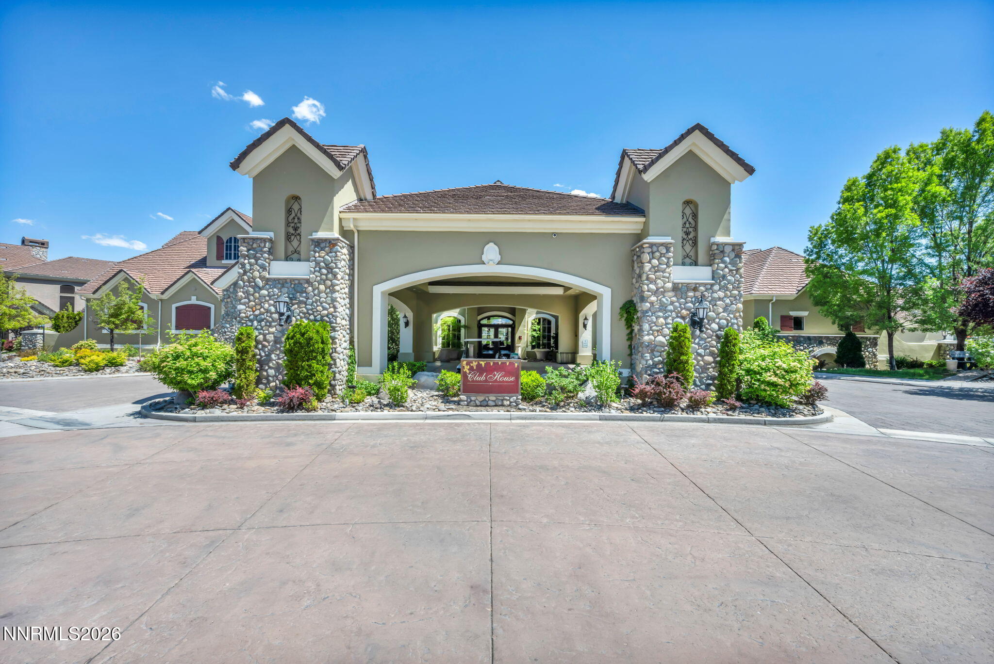 9900 Wilbur May Parkway, Unit 2801 Reno, NV 89521 - Photo 3 of 70 a front view of a house with lots of yellow lighting