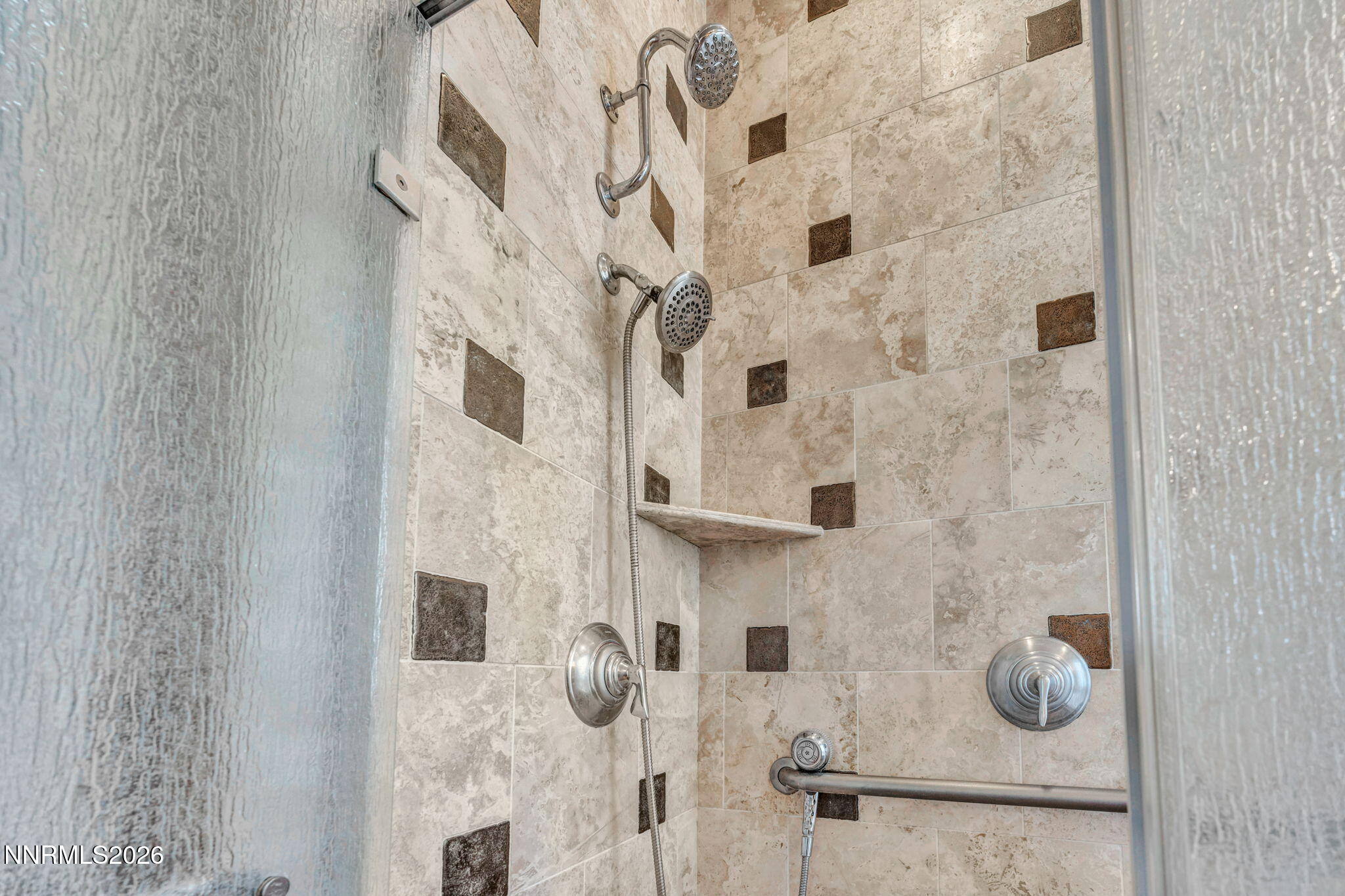 9900 Wilbur May Parkway, Unit 2801 Reno, NV 89521 - Photo 36 of 70 a bathroom with a shower