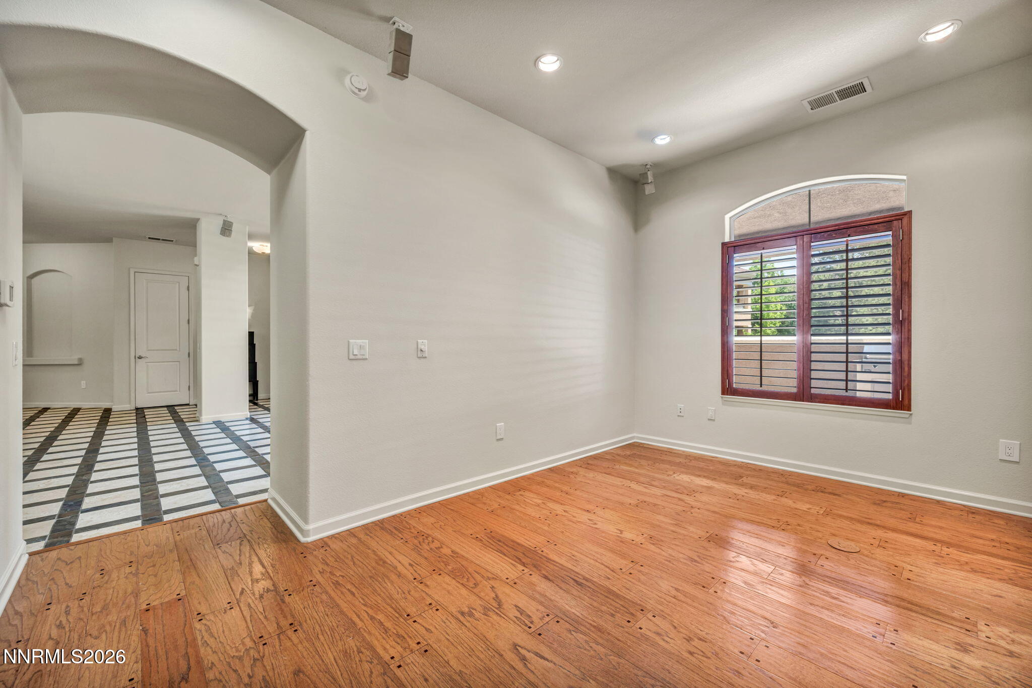 9900 Wilbur May Parkway, Unit 2801 Reno, NV 89521 - Photo 39 of 70 a view of an empty room with wooden floor