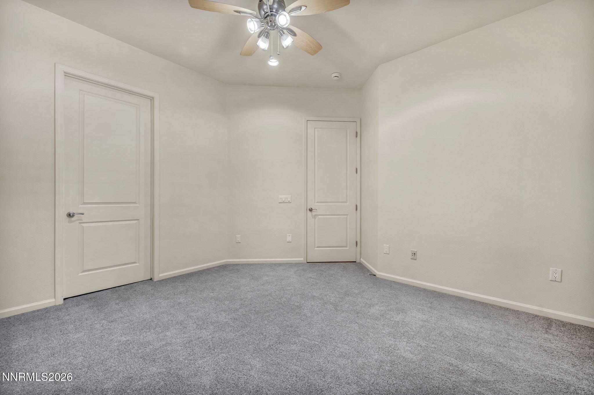 9900 Wilbur May Parkway, Unit 2801 Reno, NV 89521 - Photo 49 of 70 an empty room with a chandelier fan