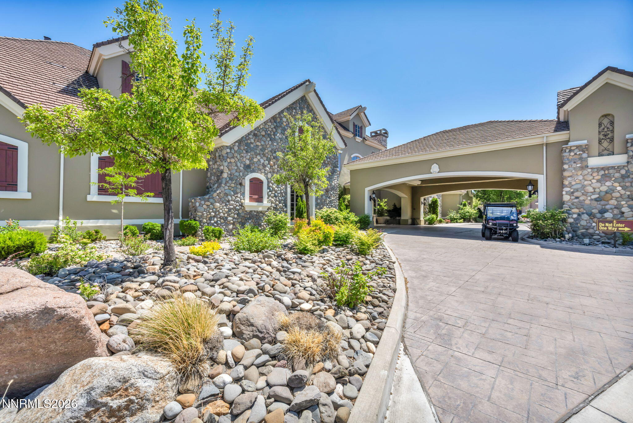 9900 Wilbur May Parkway, Unit 2801 Reno, NV 89521 - Photo 68 of 70 a front view of a house with garden