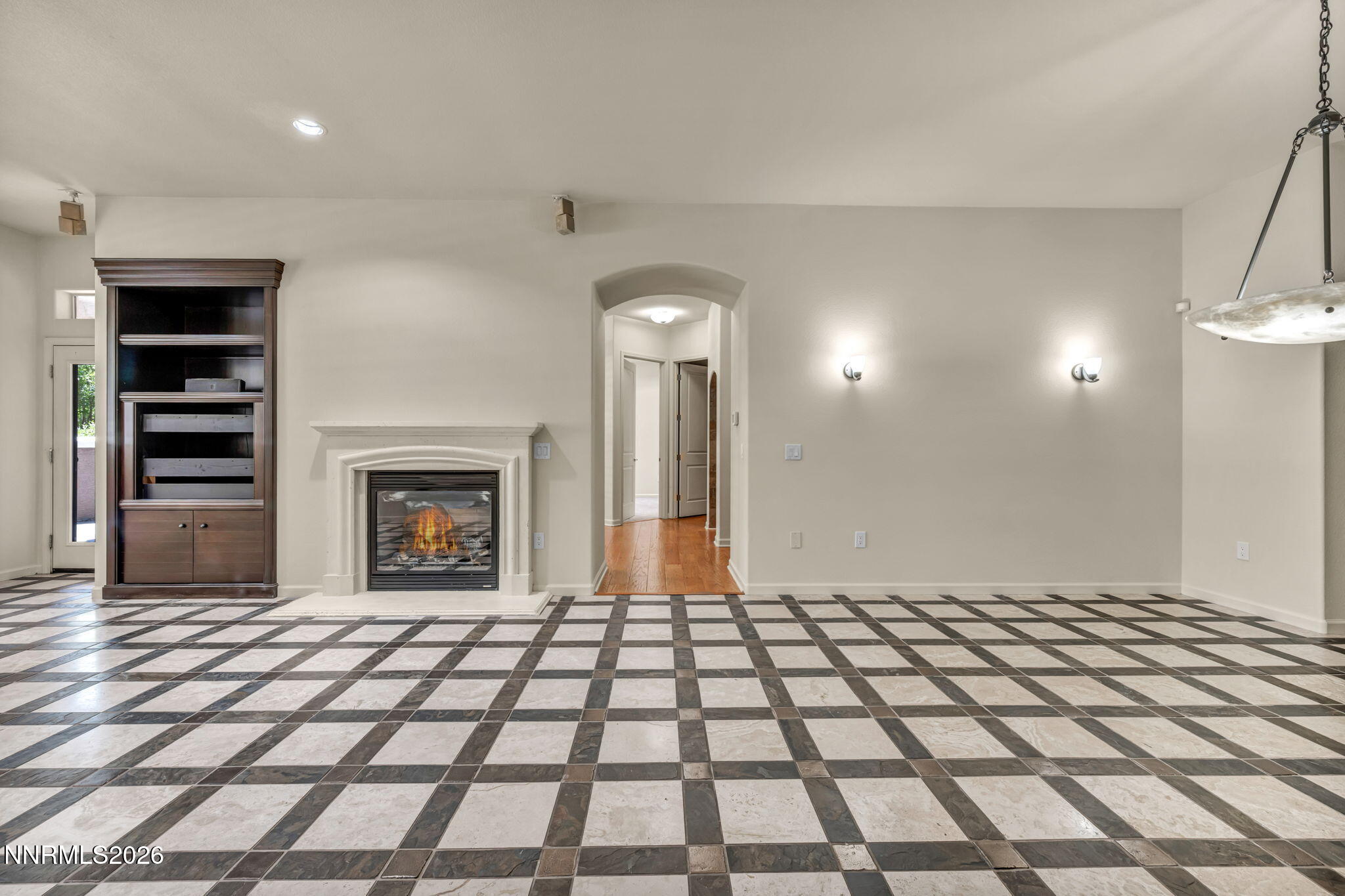 9900 Wilbur May Parkway, Unit 2801 Reno, NV 89521 - Photo 10 of 70 a view of a livingroom with a fireplace
