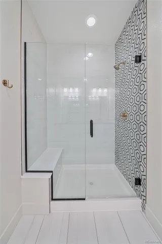 a view of a hallway with washer and dryer