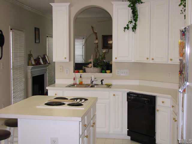 2332 Bolingbrook Lane Raleigh, NC 27613 - Photo 5 of 10 The kitchen is large and roomy loaded with plenty of cabinet and countertop space there is also a walk in pantry Other