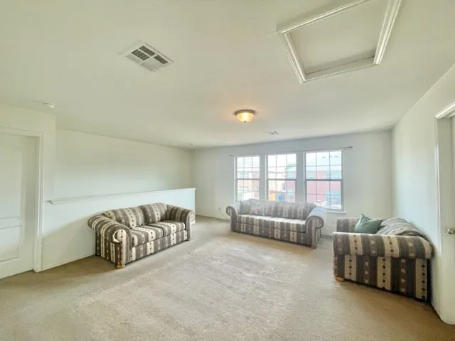 a bedroom with furniture and a couch