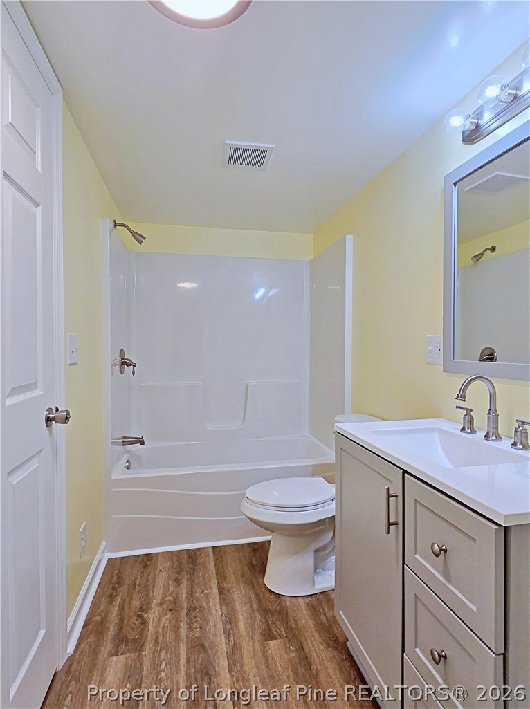 1031 Pine Acres Road White Oak, NC 28399 - Photo 19 of 29 a bathroom with a sink a toilet and shower