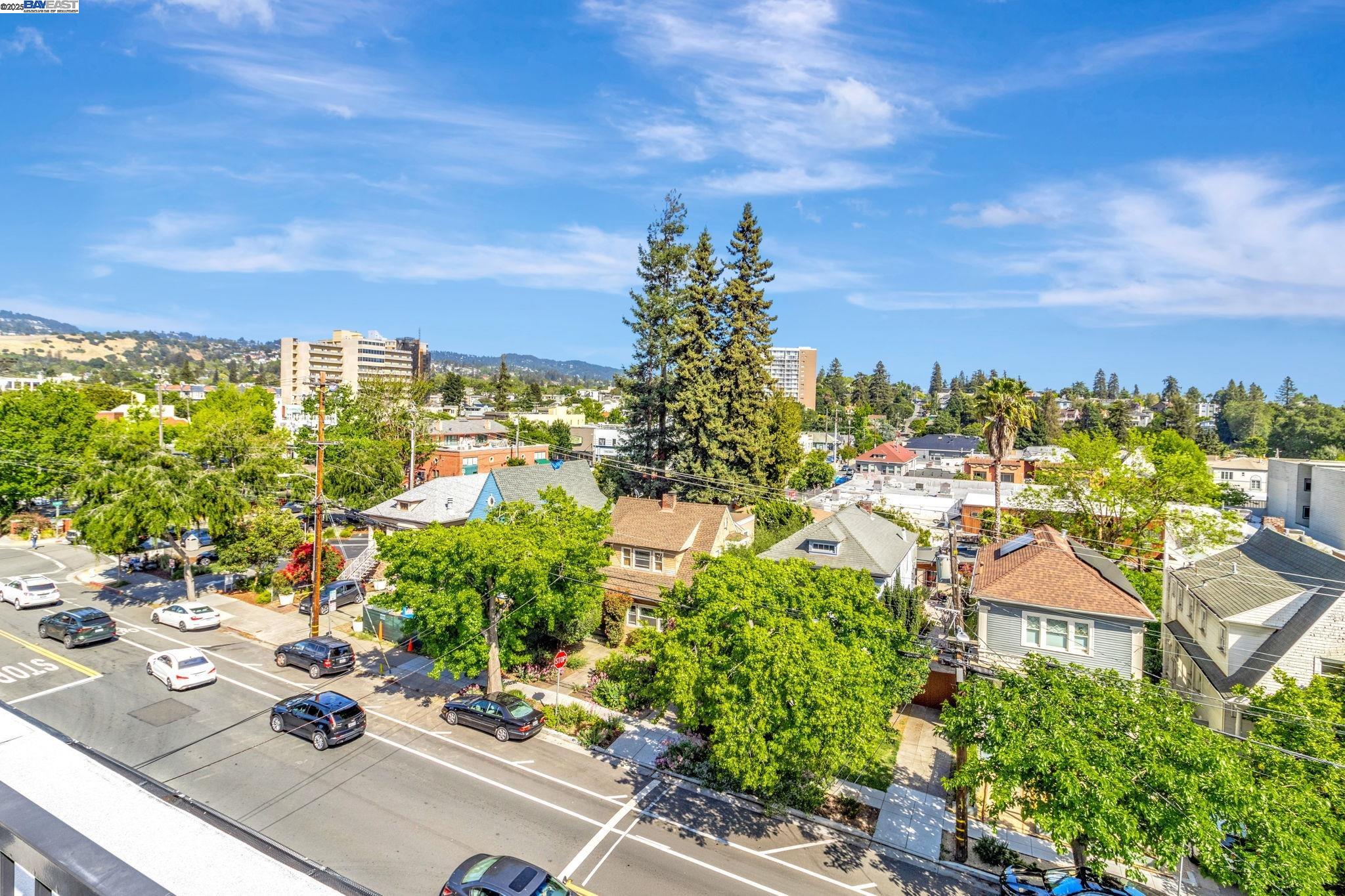 3877 Howe Street, Unit 106 Oakland, CA 94611 - Photo 16 of 17 a view of a city and an ocean view