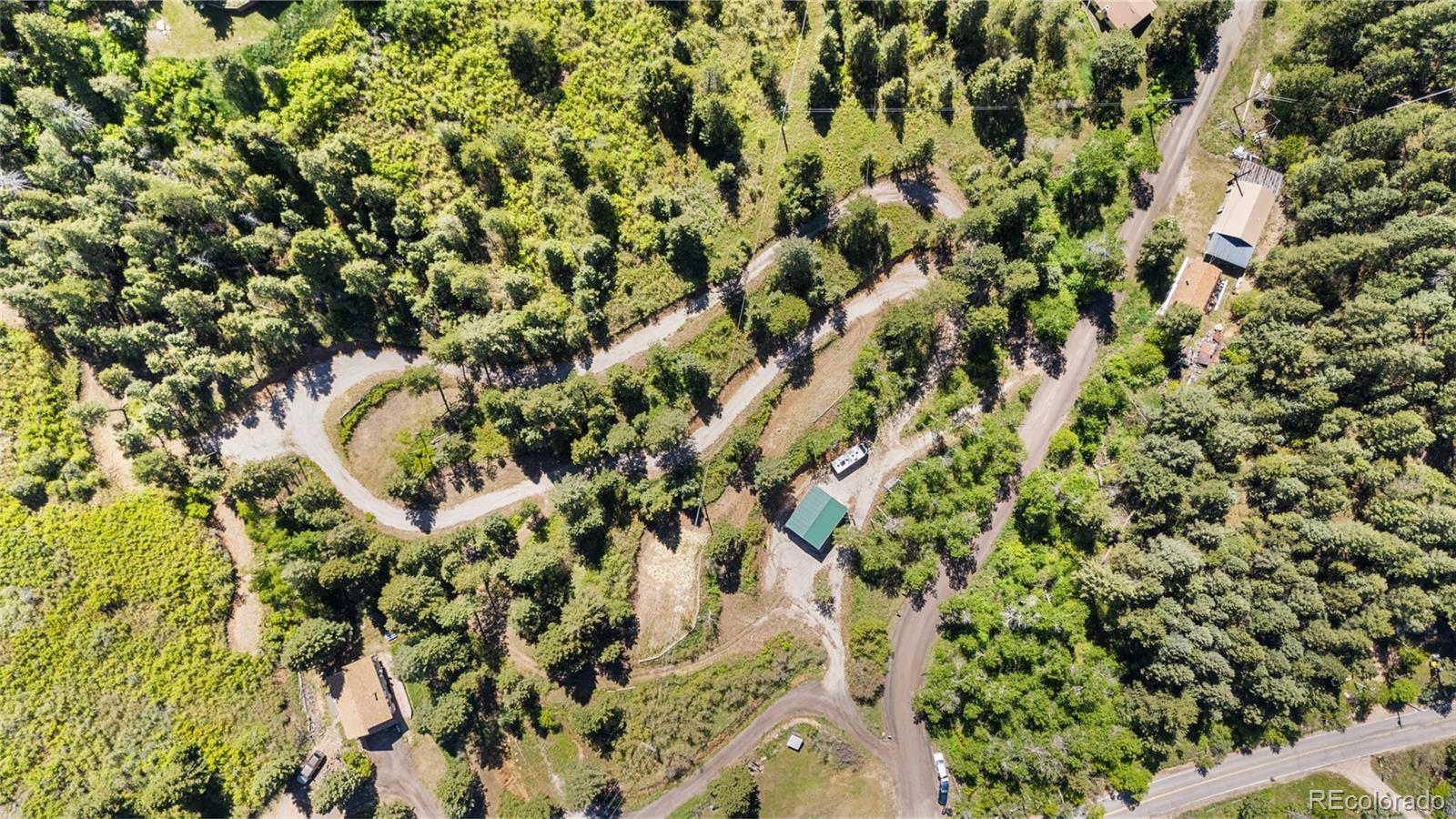 Lot 2 South Maxwell Hill Road Littleton, CO 80127 - Photo 3 of 29 a view of a yard with a plant