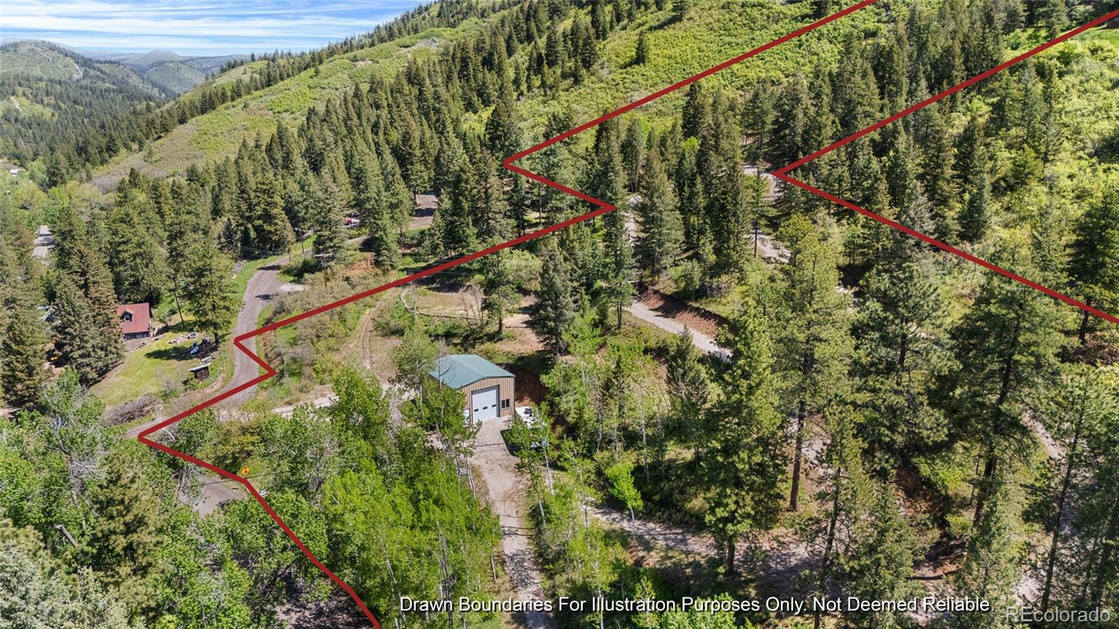 Lot 2 South Maxwell Hill Road Littleton, CO 80127 - Photo 10 of 29 a view of a yard with a flower plants