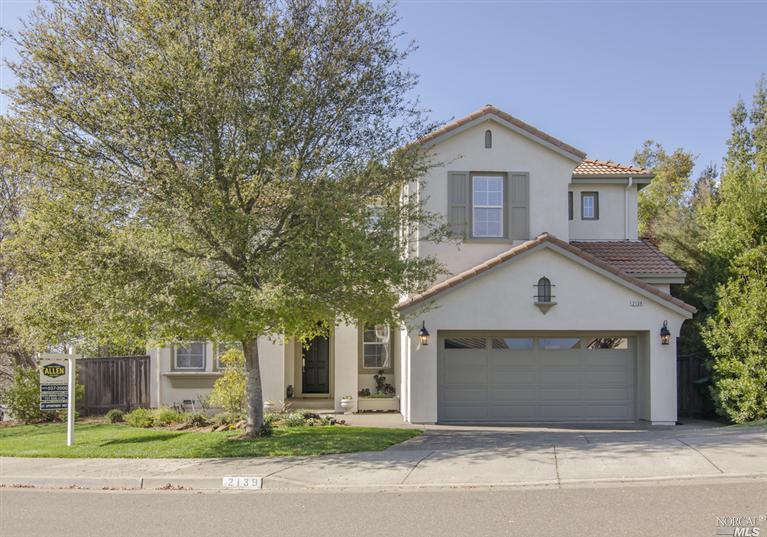 2139 Wedgewood Way Santa Rosa, CA 95404 - Photo 1 of 1 a front view of a house with yard and garage