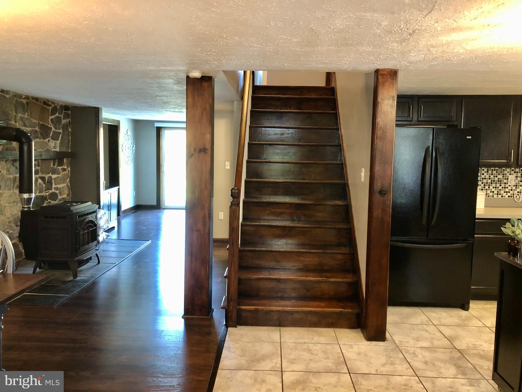 59 Steelman Marker Road Fairfield, PA 17320 - Photo 24 of 95 View of Pellet stove and stairs