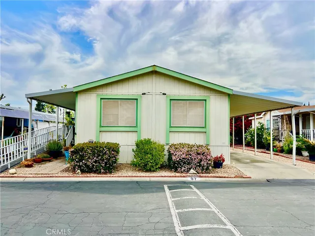 a view of a house with a garden