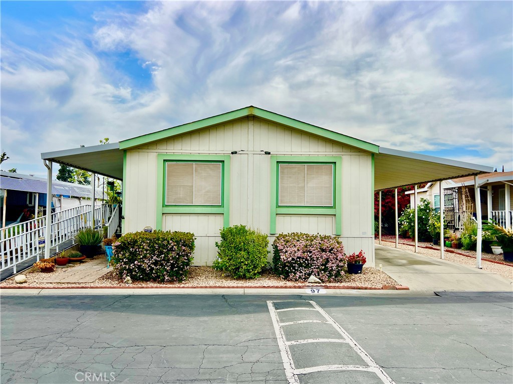 a view of a house with a garden