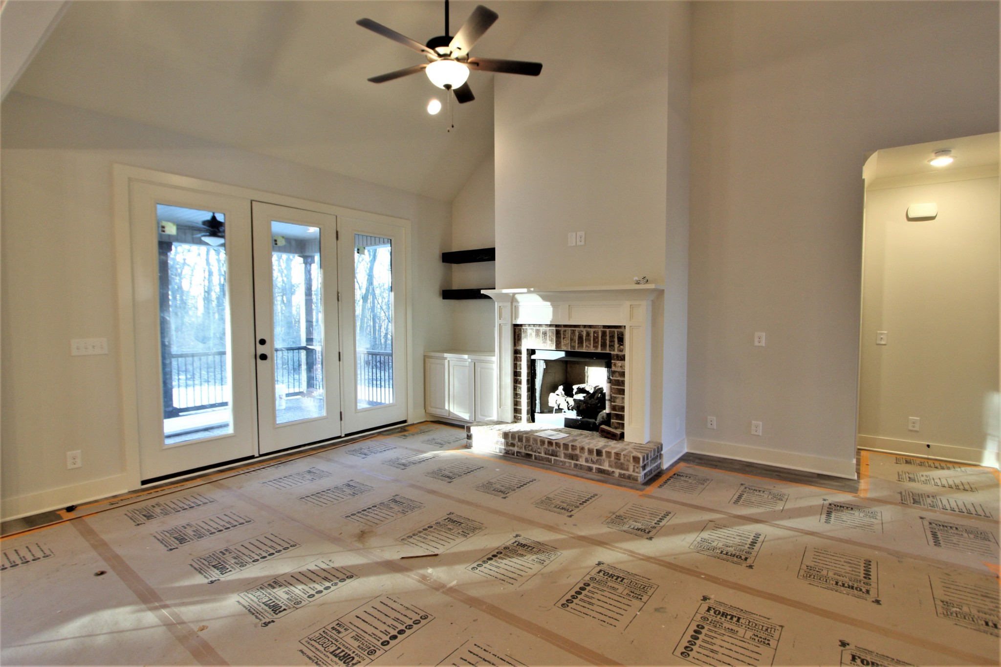 812 Ridgestone Place, Unit 103 Lebanon, TN 37087 - Photo 3 of 24 a view of a livingroom with a patio and entryway