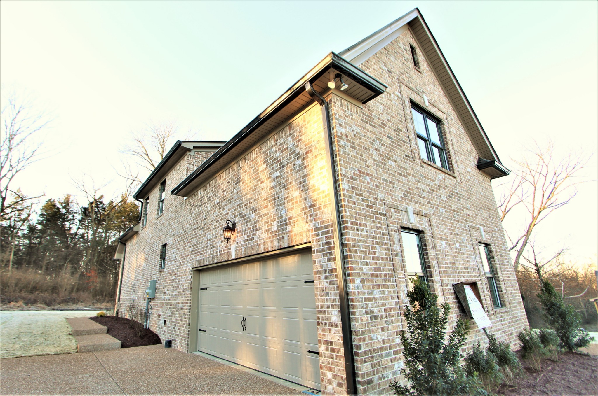 812 Ridgestone Place, Unit 103 Lebanon, TN 37087 - Photo 24 of 24 a front view of a house with a yard