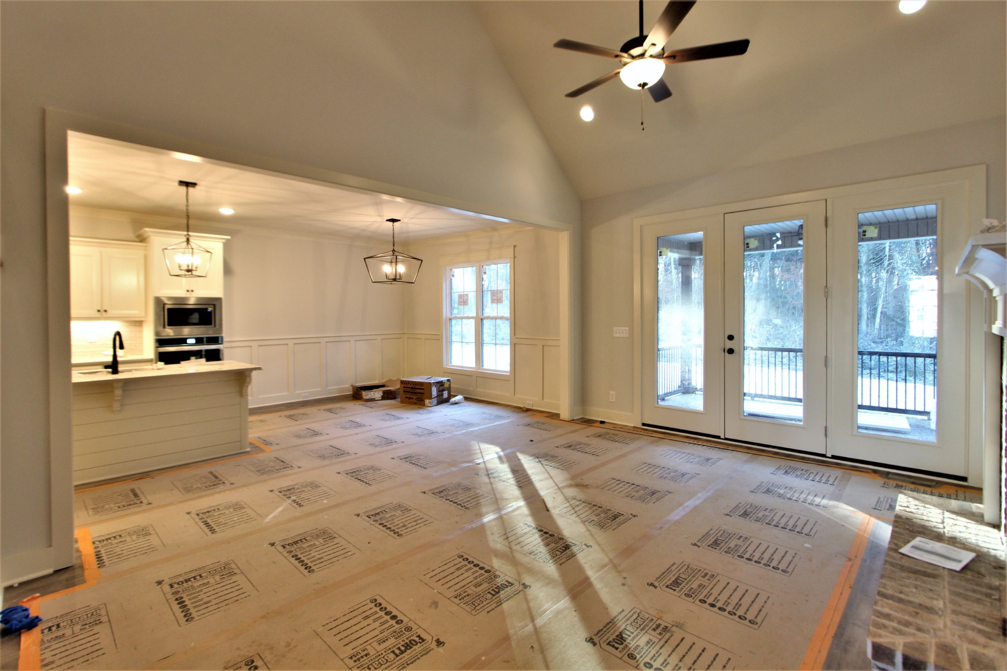 812 Ridgestone Place, Unit 103 Lebanon, TN 37087 - Photo 4 of 24 a view of an empty room with window and a kitchen