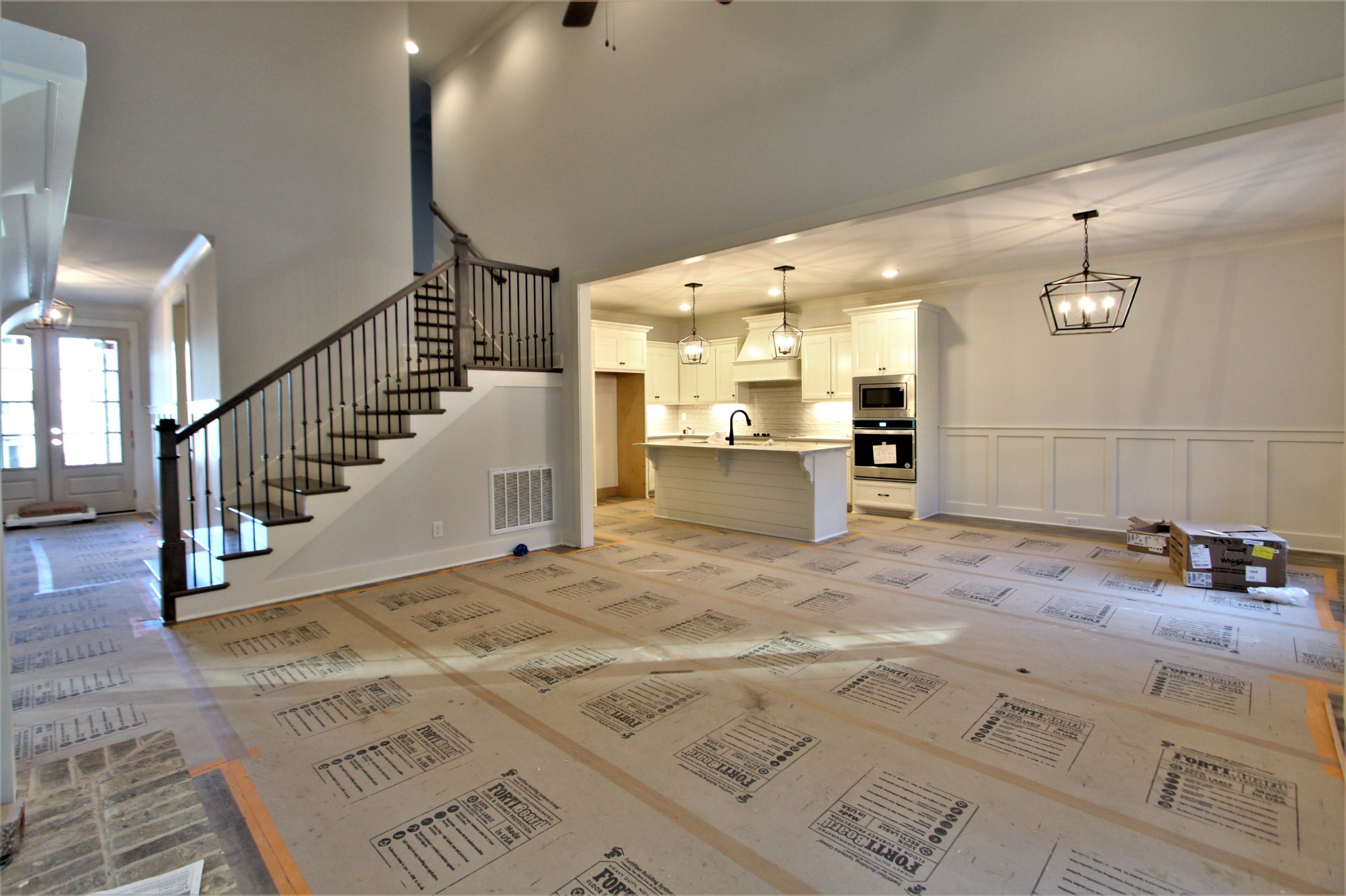 812 Ridgestone Place, Unit 103 Lebanon, TN 37087 - Photo 5 of 24 a view of a kitchen with a sink and staircase