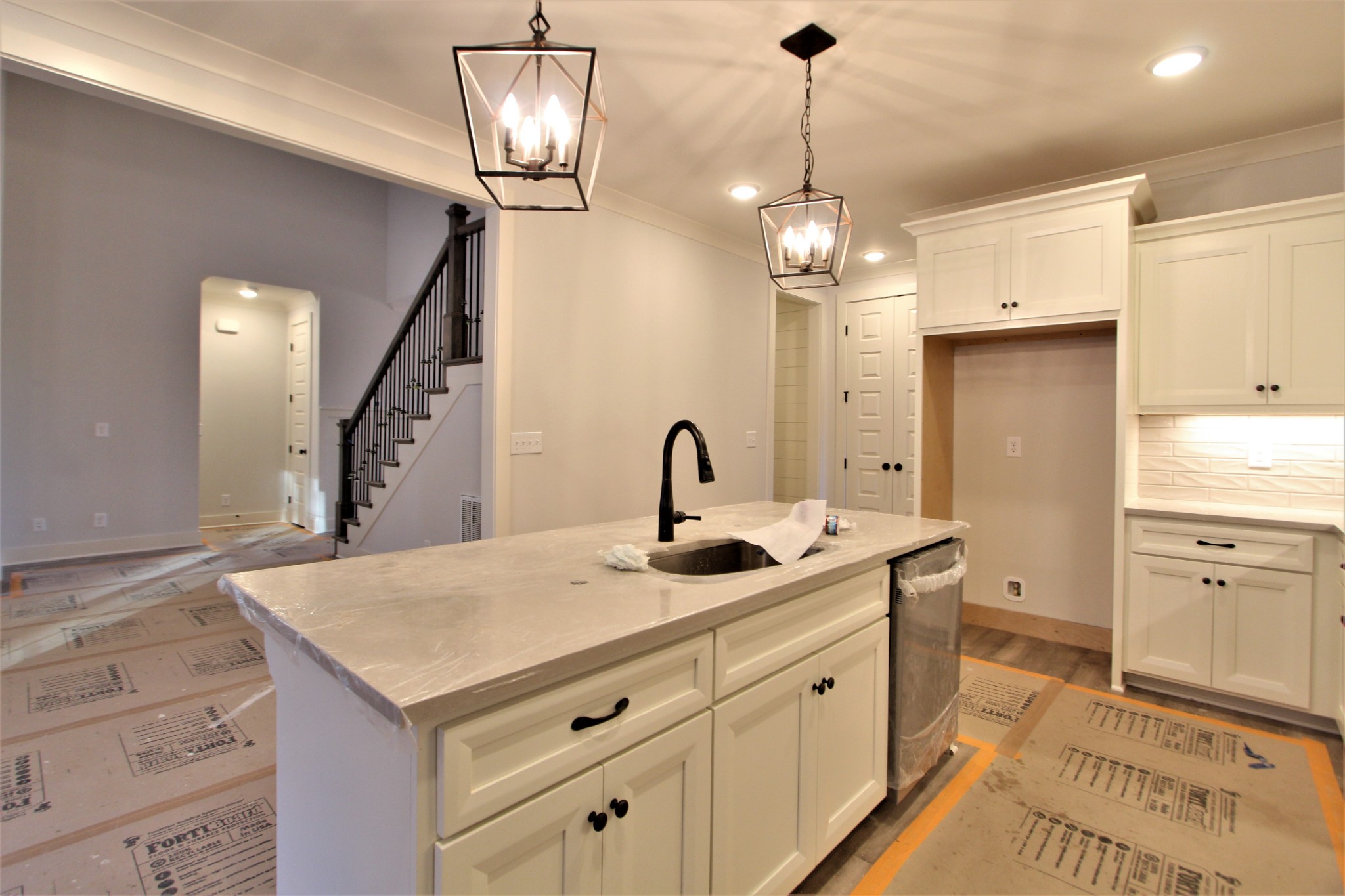 812 Ridgestone Place, Unit 103 Lebanon, TN 37087 - Photo 10 of 24 a spacious bathroom with a granite countertop sink a mirror and a shower