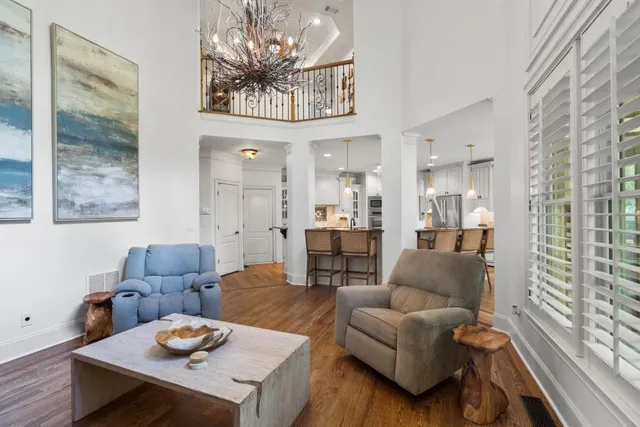 a bathroom with a toilet a sink and a mirror
