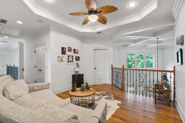 a view of livingroom with furniture and flat screen tv