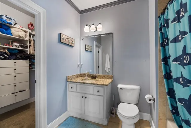 a view of a living room and bathroom