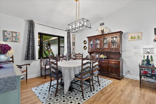 a view of a dining room with furniture