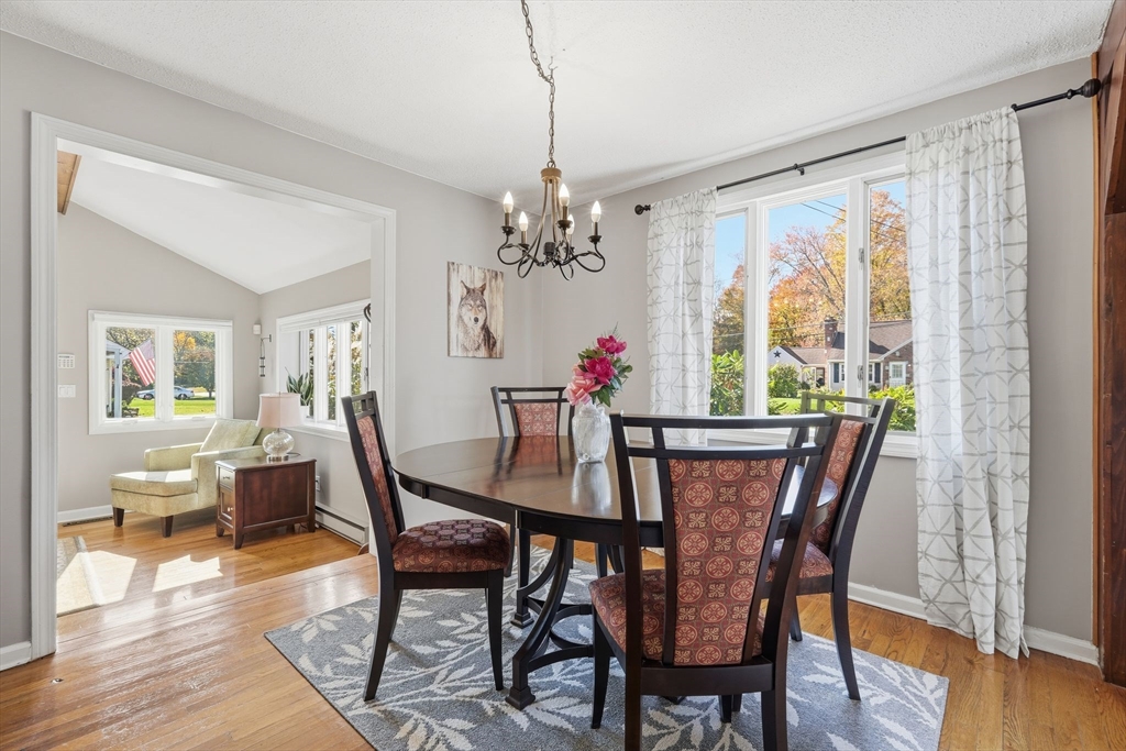 50 Overlook Drive West Springfield, MA 01089 - Photo 7 of 28 a view of a dining room with furniture wooden floor and chandelier