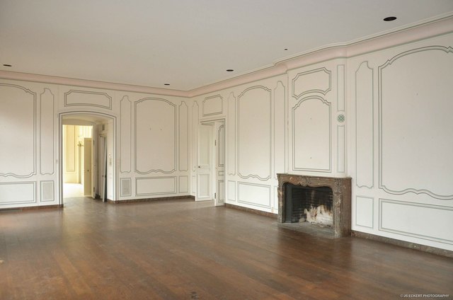 830 North Green Bay Road Lake Forest, IL 60045 - Photo 11 of 24 a view of empty room with wooden floor and fireplace