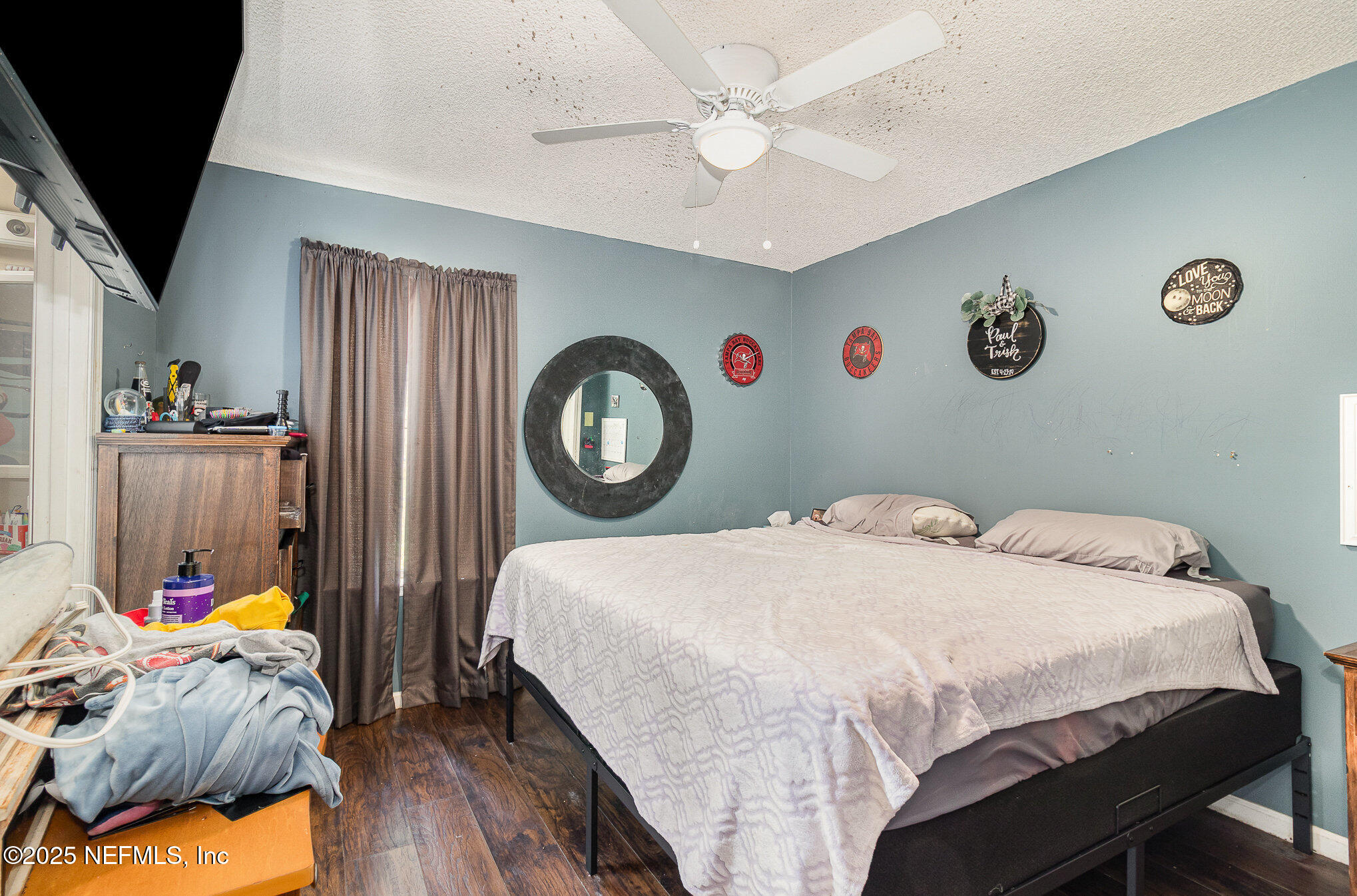 104 East Oakside Drive Interlachen, FL 32148 - Photo 15 of 26 a bedroom with a bed and a window