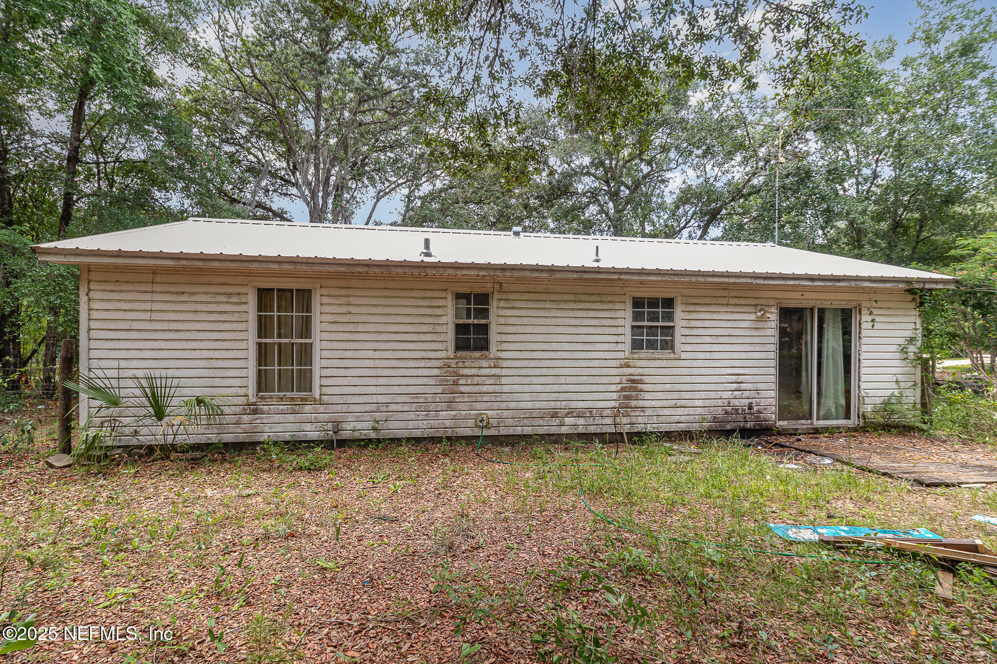 104 East Oakside Drive Interlachen, FL 32148 - Photo 23 of 26 a view of a house with a yard