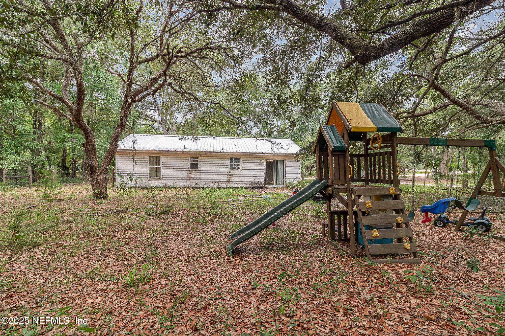 104 East Oakside Drive Interlachen, FL 32148 - Photo 26 of 26 a view of a house with a yard