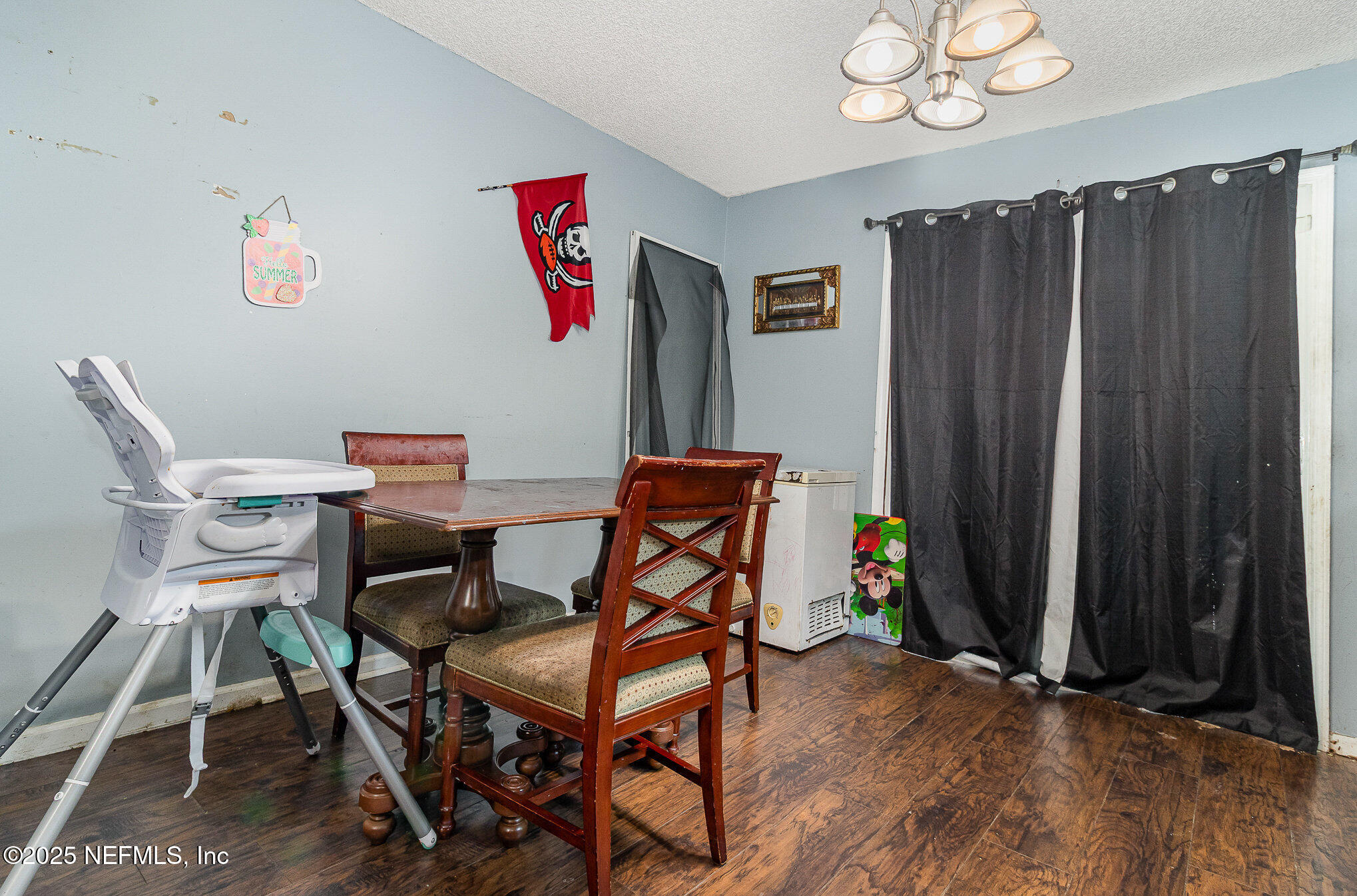 104 East Oakside Drive Interlachen, FL 32148 - Photo 9 of 26 a work room with furniture and wooden floor