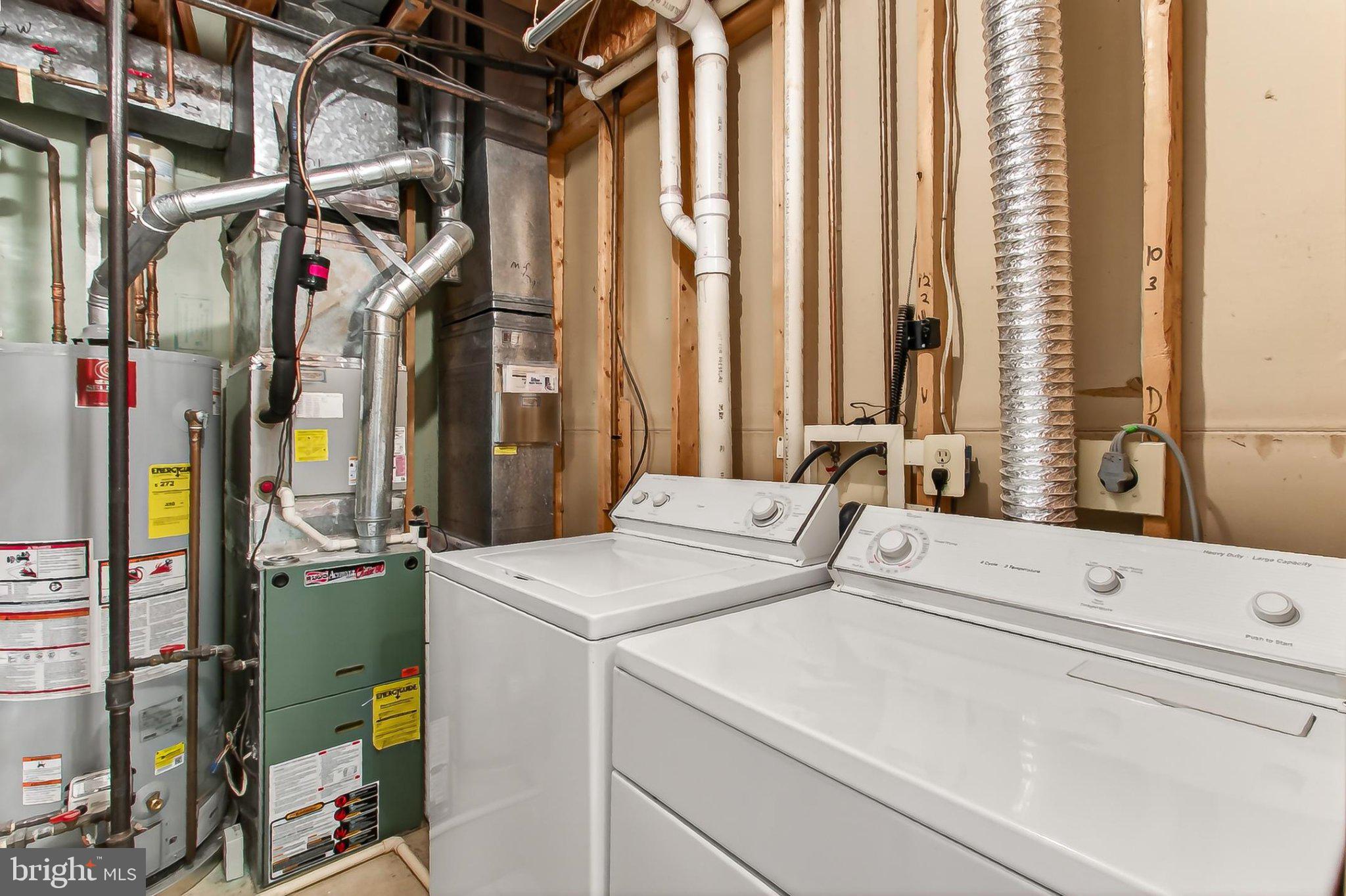 13157 Kidwell Field Road Herndon, VA 20171 - Photo 37 of 50 Efficient laundry space in a basement.