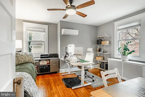 a bathroom with a sink a toilet and tub