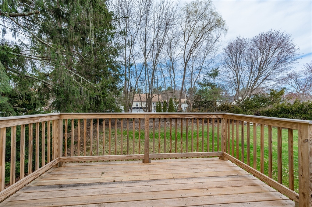 12 Pichowicz Road Billerica, MA 01821 - Photo 30 of 31 a view of balcony with wooden floor and fence