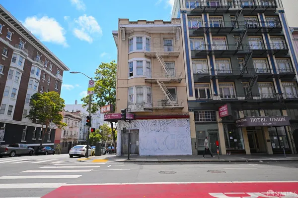 a front view of a building with street view